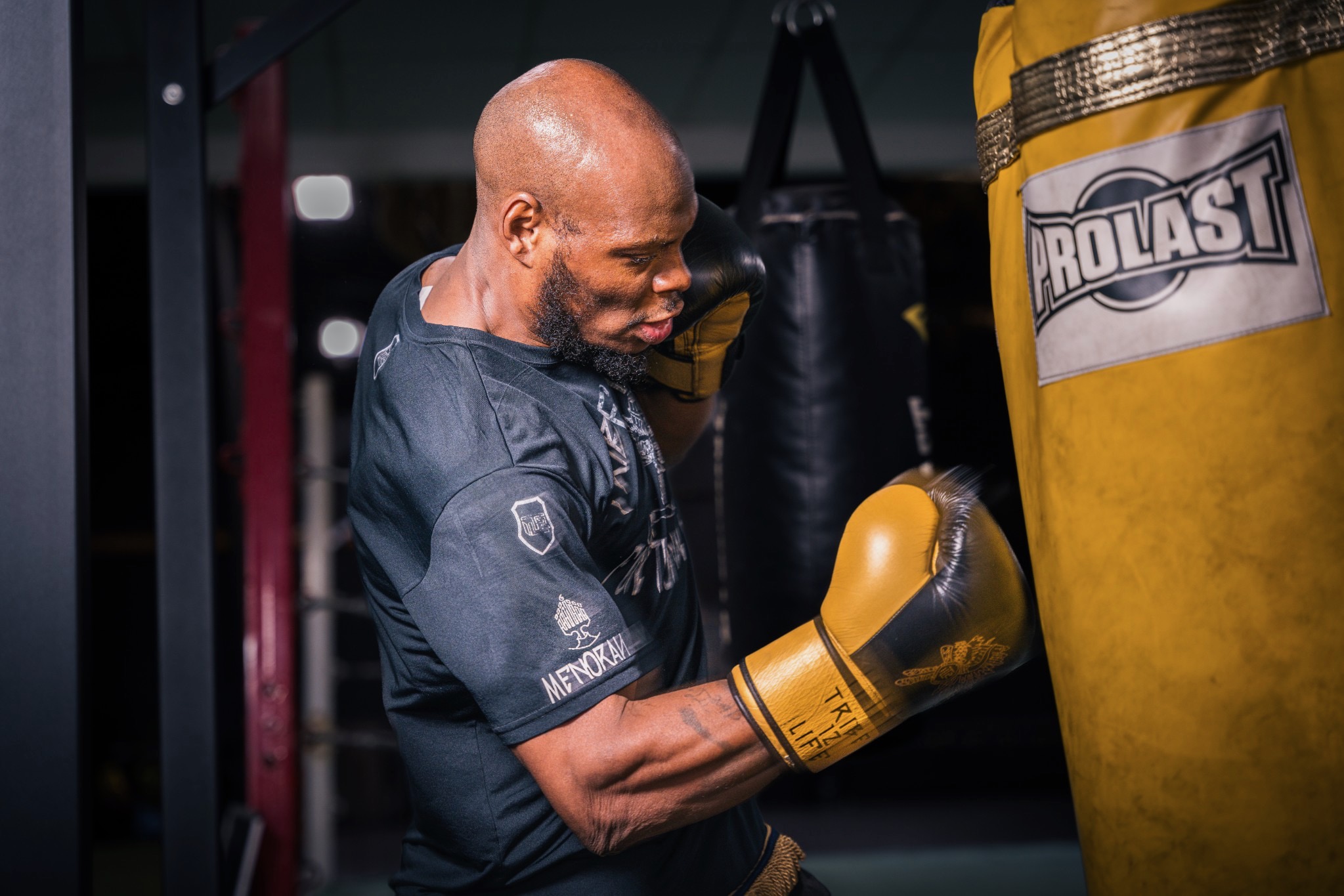 High-intensity training class utilizing kettlebells and functional boxing circuits