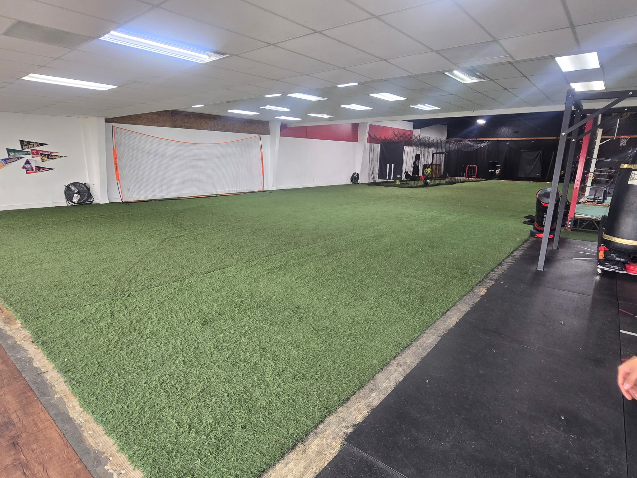Strength and conditioning circuit using battle ropes and weighted bags at the gym